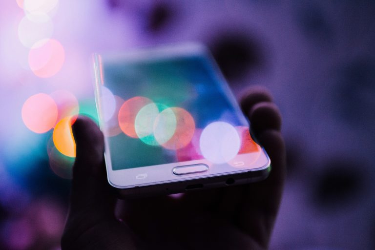 Close-up photo of hand holding iPhone