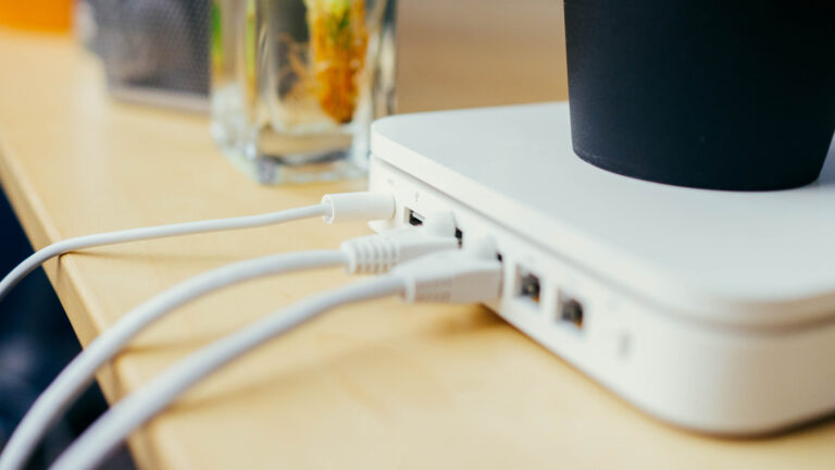 Back of home router on a table.
