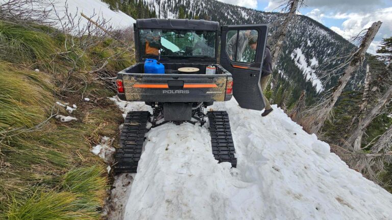 Vehicle stalled in snow on Sandpoint Baldy.