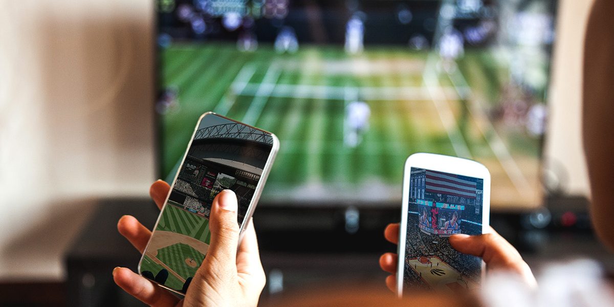 People watching tennis on TV and basketball and baseball on their phones.