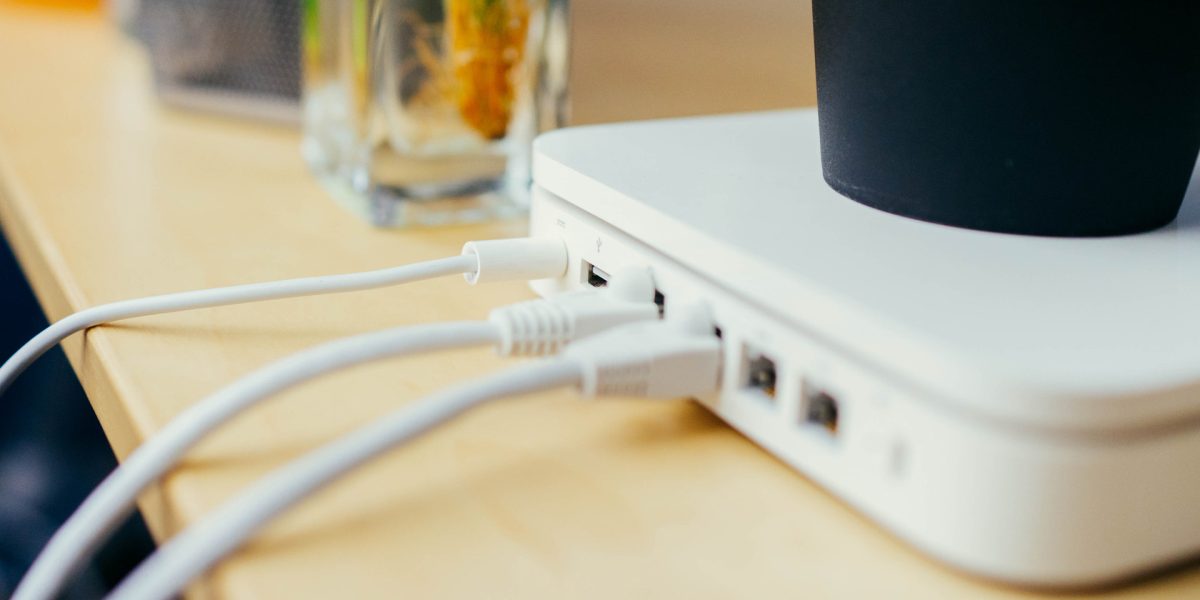 Back of home router on a table.