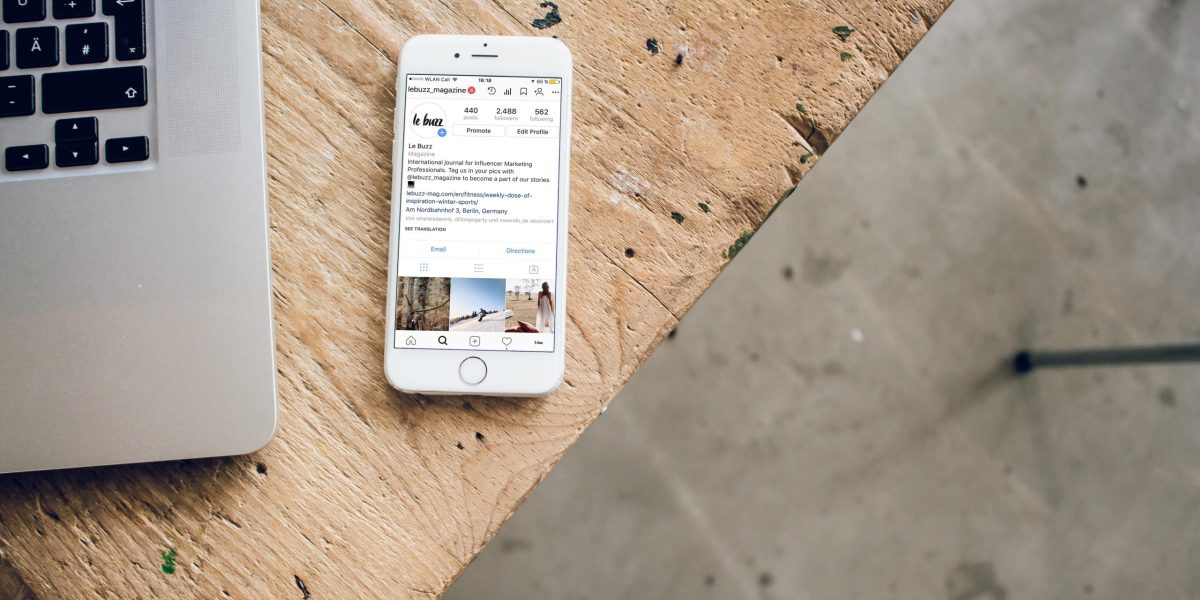 Phone sitting on table logged into a social media app