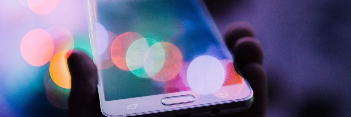 Close-up photo of hand holding iPhone